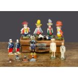 A selection of historical and cartoon characters, Including a 90mm Mickey Mouse figure, probably