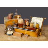 Various wooden boxes, an oak box with metal fittings —12½in. (32cm.) wide; a cork circular box;