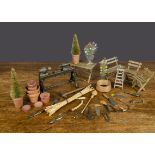 Dolls’ house and miniature tools and gardening, a German cast-iron engineering lathe, painted