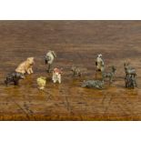 Miniature cold-painted bronze animals, a marabou --?in. (2cm.) high, a chick charm, a penguin, a