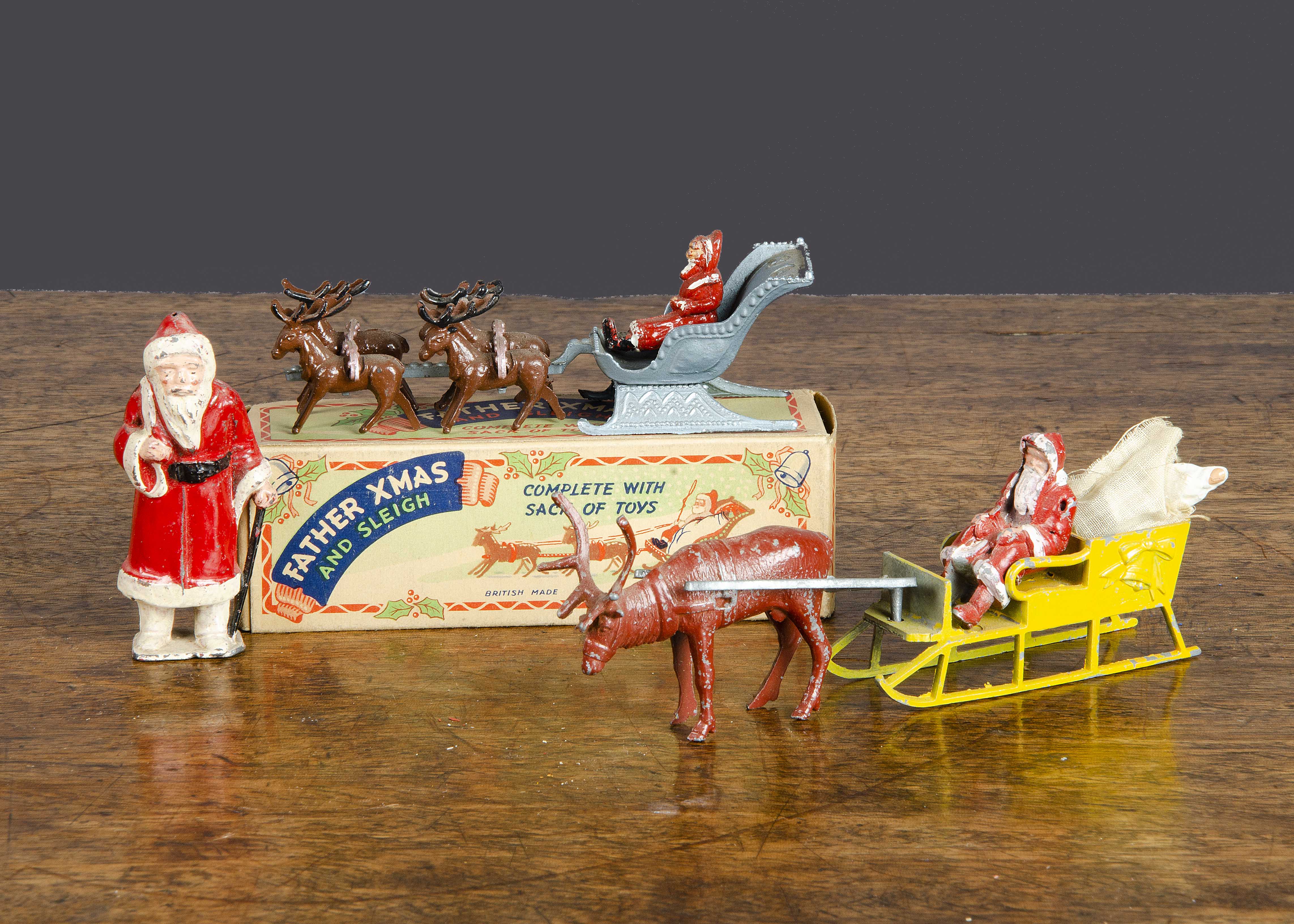 Father Christmas in his sleigh by Benbros and Morestone, Benbros sleigh with figure in toy sack,