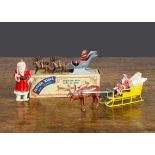 Father Christmas in his sleigh by Benbros and Morestone, Benbros sleigh with figure in toy sack,