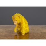 A German clockwork seated dancing bear, carton covered in golden mohair, orange and black glass