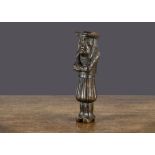 A French carved wooden man nutcracker, the sad faced figure with long hair, wearing pantaloon, clogs