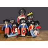 Nine post-war Golliwogs, Including a traffic warden and a Dean’s Childsplay with card labels (some