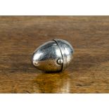 A Dutch silver egg-shaped box, with push-button clasp, the outside chased with bands of Greek key