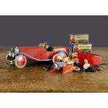 A Meccano Constructor Car No 1, painted red and blue, clockwork motor, lead driver and white