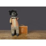 An unusual early Golliwog, with black cloth upturned pointed face, black boot button eyes with white