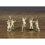 Heyde Germany 35mm Tennis Doubles match with net, players include two females and three males (