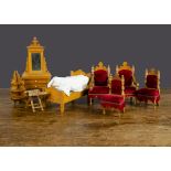 Schneegas dolls’ house furniture, comprising two armchairs and two chairs upholstered in Burgundy