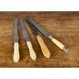 Four 19th Century carved ivory-handled bread knives, one carved with a corn on the cob, two carved