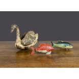 Tinplate aquatic animals, a German painted tinplate swan with propeller —7in. (17.5cm.) long (P,