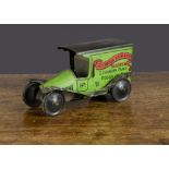 A Hot Bread Kook & Coy Baker’s tinplate van, push-a-long, painted green and black, baker’s name