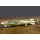 A Tipp & Co clockwork tinplate Graf Zeppelin DLZ 127, lithographed silver with blue lining and