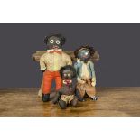Three Golliwogs, an early example with a long nose, linen button eyes, stitched mouth, fur hair,
