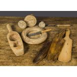 Wooden butter tools, three butter paddles; three butter moulds, one carved with a ewe and the others