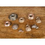 Seven miniature copper moulds, two fish, two cornucopia and three circular bundt shaped, all with