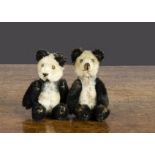 Two Schuco miniature pandas, with black and white mohair, metal pin eyes, black stitched noses and