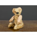 A small Chad Valley pink artificial silk plush teddy bear 1930s, with orange and black glass eye,