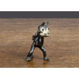 A Pixyland/Kew lead Felix the Cat, in traditional ‘Keep on Walking’ pose —3in. (7.5cm.) high (F,