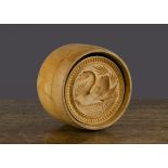 A large wooden butter stamp carved with swan, plunger type —5in. (12.5cm.) diameter