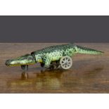 An Einfalt clockwork lithographed tinplate crocodile, with articulated head, mouth and tail on