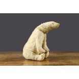 A small early Steiff polar bear circa 1912, with white mohair, tiny black boot button eyes,