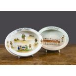 Two Grimwades Brownie Baby Plates, oval, each transfer decorated with Brownies, one from around