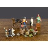 German and French made lead figures including solid lead small animals, large Penguin and two