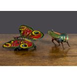 Lithographed tinplate insects, a German clockwork butterfly with articulated wings and wheels —