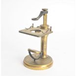 An early 20th Century lacquered brass J H Steward Dissection Microscope, lacks objectives, with