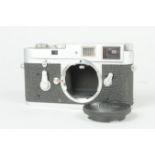 A Leitz Wetzlar Leica M2 Camera Body chrome, serial no. 1 021 763, 1961, body G, small dent below
