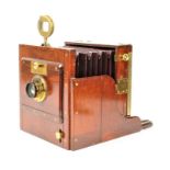 A late 19th Century mahogany and brass 6in x 6in for half-plate Tailboard Camera, with two
