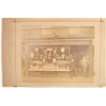 Ephemera relating to Godfrey Batting, including albumen print of shop front ' T Gilbert Batting & Co