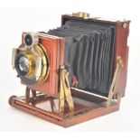 An early 20th Century comprehensive mahogany and brass quarter-plate Thornton-Pickard 'Amber'