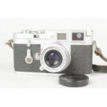 A Leitz Wetzlar Leica M3 Camera, chrome, serial no. 735 742, 1955, double-stroke, modified rewind