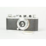 A Leitz Wetzlar Leica II Camera, serial no. 191 233, 1936, body F-G, shutter working, with a Leitz
