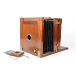 A late 19th Century home-made/hand-made mahogany and brass whole-plate Tailboard Studio Camera, made