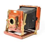 A Houghton mahogany and brass half-plate "Sanderson Junior" Field Camera, with Sanderson