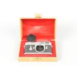 A Leitz Wetzlar Leica M3 Double Stroke Body, chrome, serial no. 817 037, 1956, with viewfinder frame