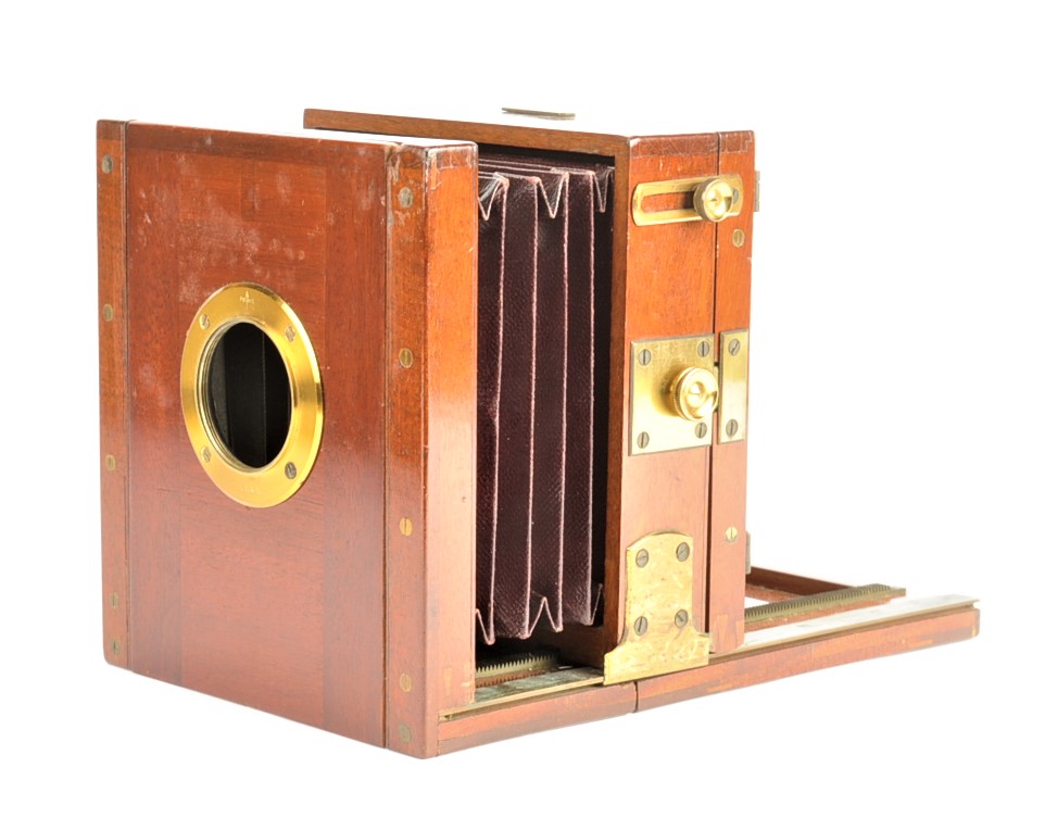 A 19th Century mahogany and brass quarter-plate Tailboard Camera, with swing and tilt back, now