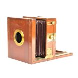 A 19th Century mahogany and brass quarter-plate Tailboard Camera, with swing and tilt back, now
