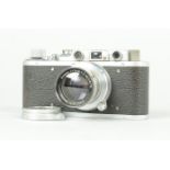 A Leitz Wetzlar Leica II Camera, serial no. 309508, 1935, body F, scuffing and marks to top and