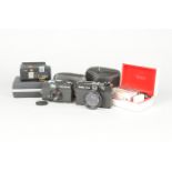 Rollei Compact Cameras, a Rollei XF 35 rangefinder camera, shutter working, not battery tested, body