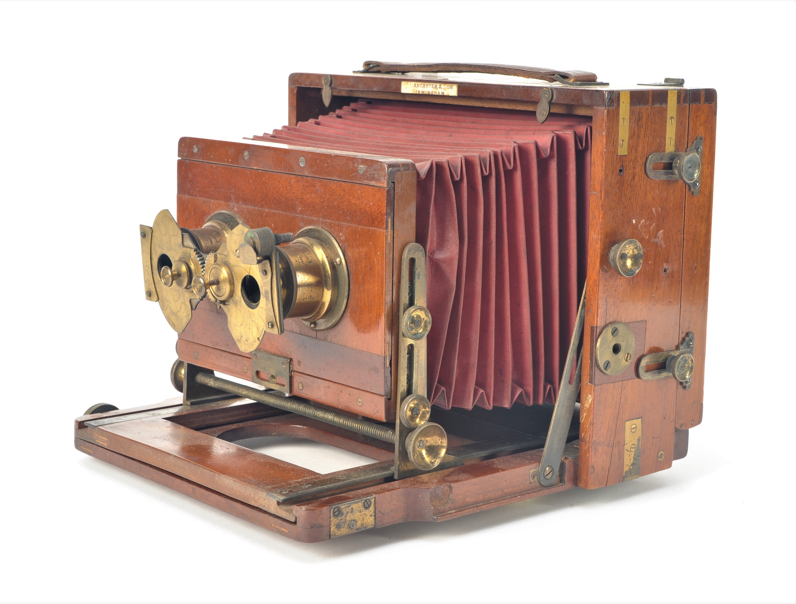 A late 19th Century mahogany and brass-bound 7¼in x 4½in Lancaster Stereo Instantograph, with pair