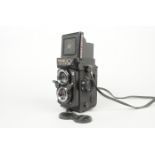A Yashica Mat 124 G TLR Camera, serial no 086242, shutter working, body VG, Dymo labels stuck to