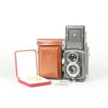 A Rolleicord IV TLR Camera, serial no. 1 377 847, circa 1954, body G, dust on mirror, shutter