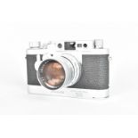A Leitz Wetzlar Leica IIIg Camera with Leicavit, serial no. 827 329, 1956, body G-VG, shutter and