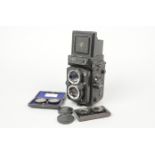 A Yashica Mat 124 G TLR Camera, serial no 1111818, shutter working, body G, some scratches to