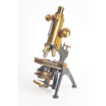 An early 20th Century W Watson & Sons lacquered and anodised brass Compound Monocular Microscope,